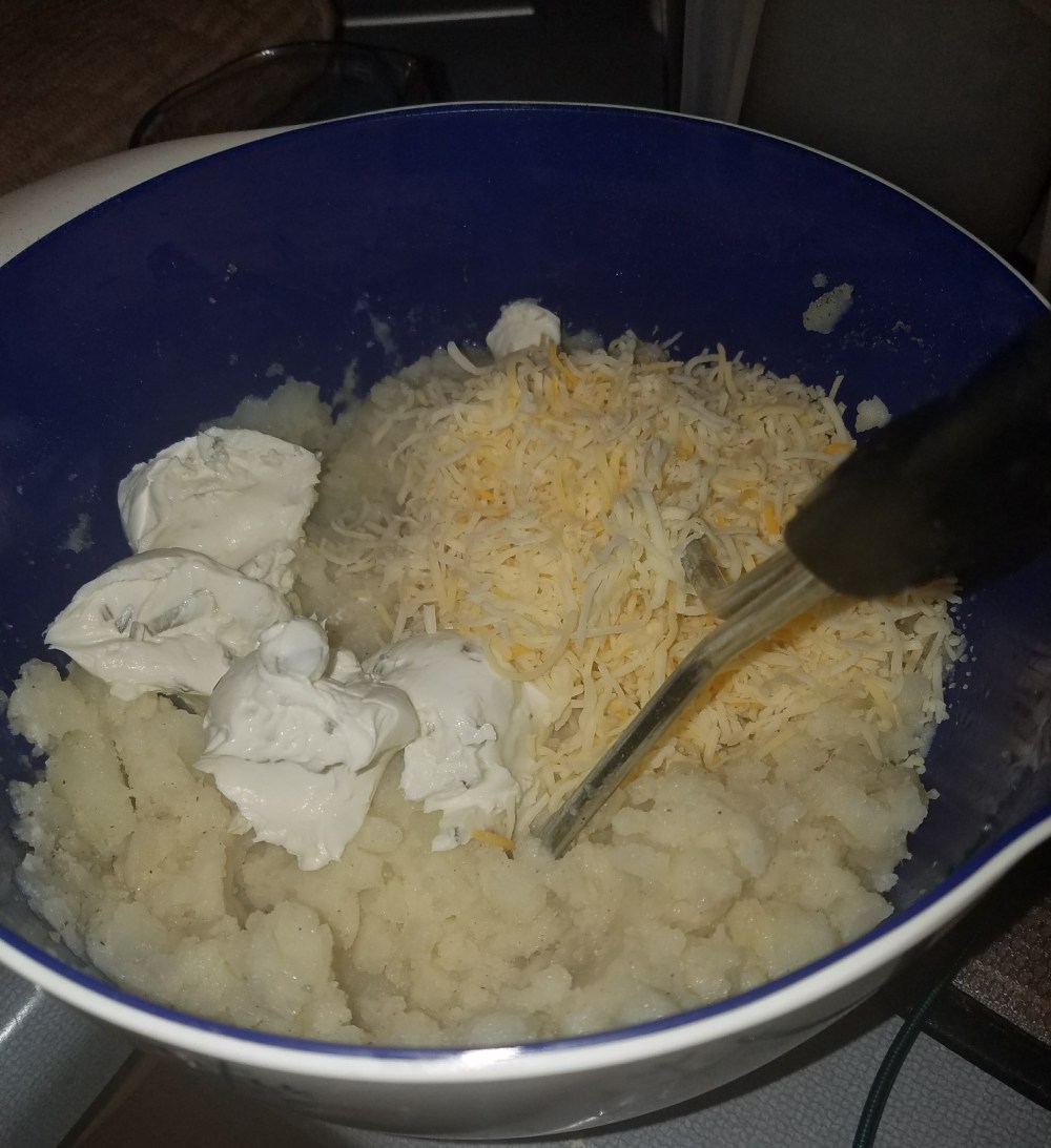 potatoes with ingredients before filling